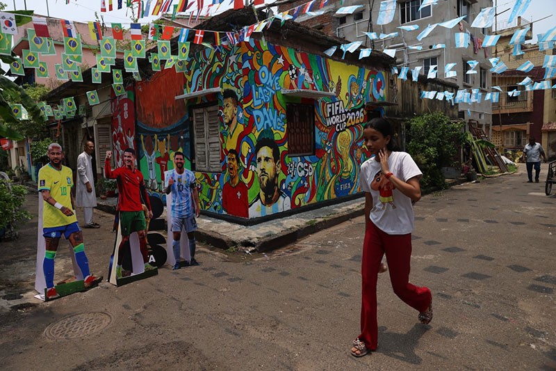 In Images: Children in Kolkata play beneath a giant World Cup masterpiece