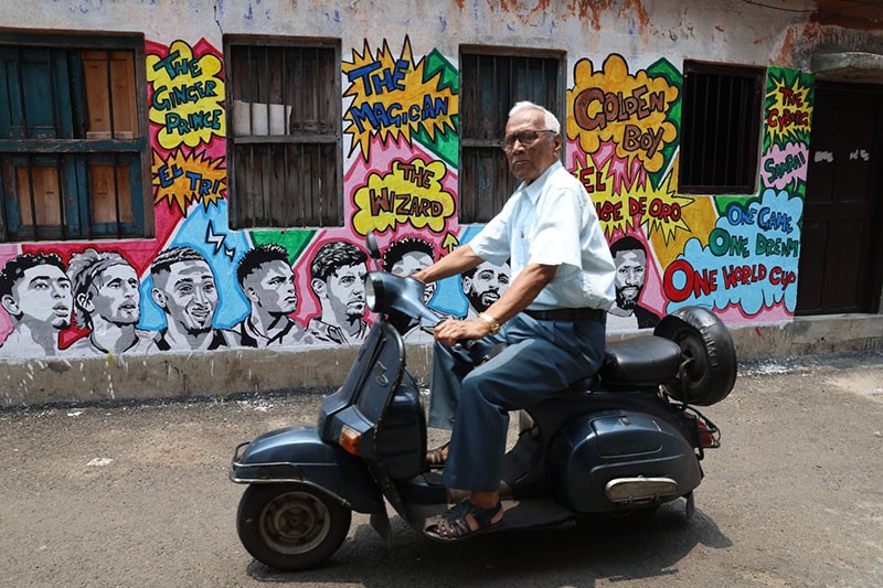 In Images: Children in Kolkata play beneath a giant World Cup masterpiece