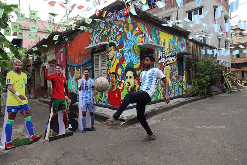 In Images: Children in Kolkata play beneath a giant World Cup masterpiece