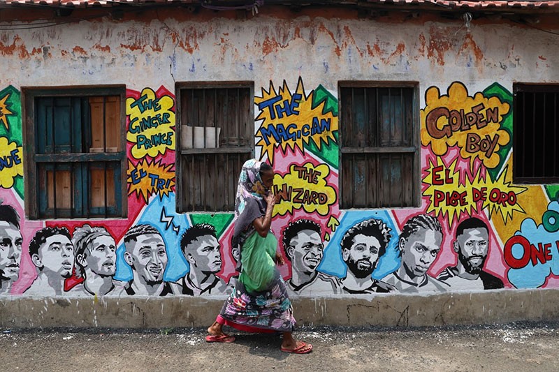 In Images: Children in Kolkata play beneath a giant World Cup masterpiece