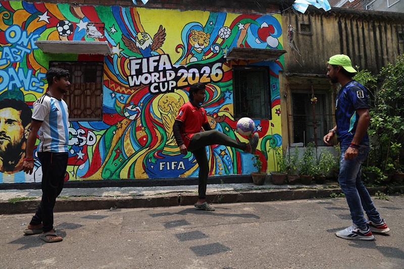 In Images: Children in Kolkata play beneath a giant World Cup masterpiece