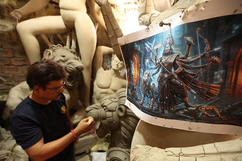 In Images: Kumartuli Artist Creates AI Robot Durga for Durga Puja 2026