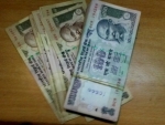 Rupee opens at 60.66 per dollar