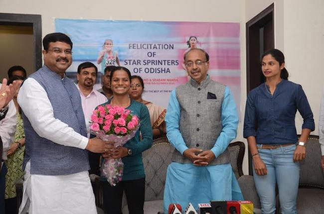 Dutee Chand , Shrabani Nanda felicitated by Union Minister Dharmendra Pradhan