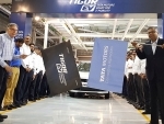 N Chandrasekaran, Chairman, Tata Sons and Tata Motors flags off the Tigor EVs from Sanand plant