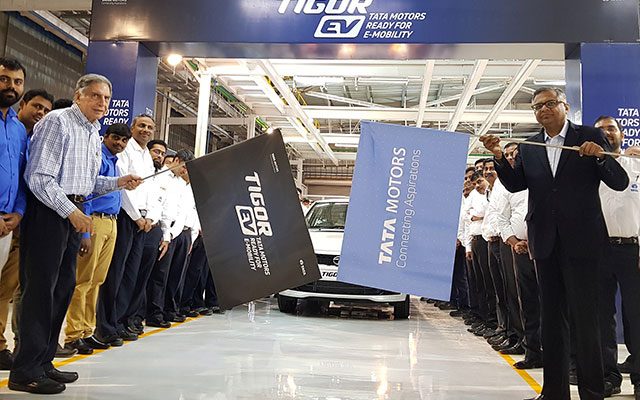 N Chandrasekaran, Chairman, Tata Sons and Tata Motors flags off the Tigor EVs from Sanand plant