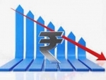 Indian Rupee down 13 paise to 71.74 against USD