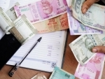 Rupee falls by 4 paise against USD