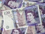 Bank of England cuts main interest rate to 0.25 pc