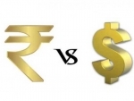Indian Rupee up by 9 paise against USD