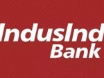 IndusInd Bank moves down by 12.30 pc to Rs 400.80