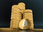 Bitcoin tops $58,000