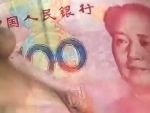 Chinese yuan hits record low against USD