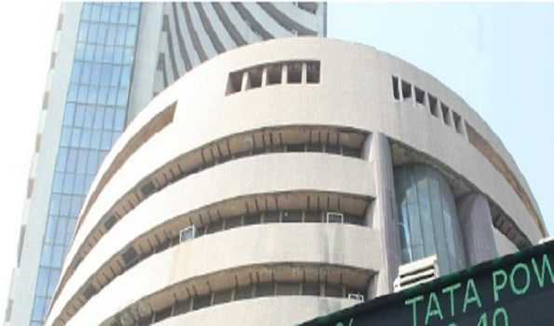 Sensex slips 199 points after touching record high, Nifty ends 65 points below