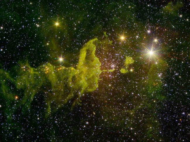 A space spider watches over young stars