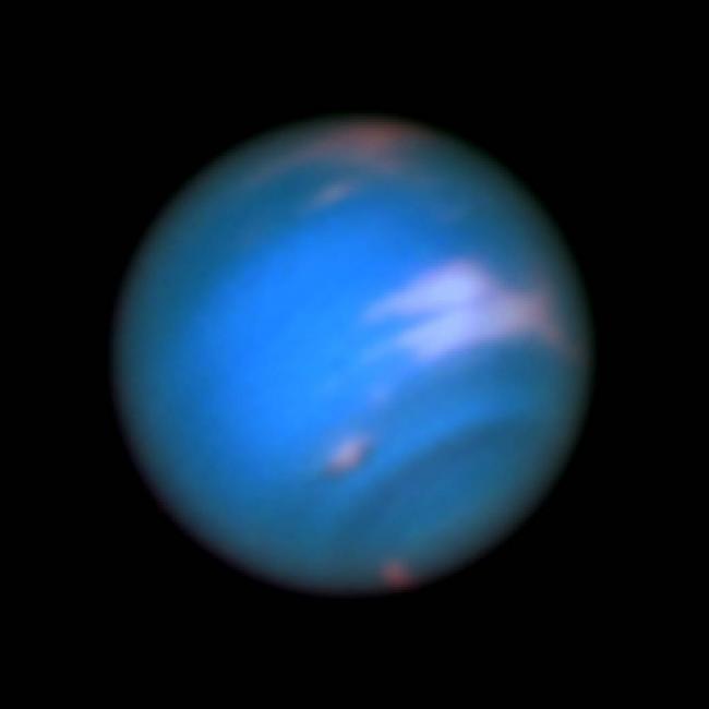 Hubble sees new dark spot on Neptune