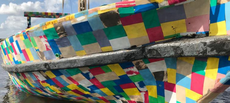 Boat made of recycled plastic and flip-flops inspires fight for cleaner seas along African coast
