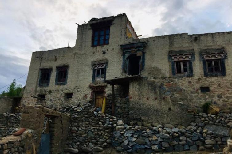 A traditional old Ladakhi house made of stone, mud and poplar wood in Phyang village. Photo by Rama Dwivedi.
