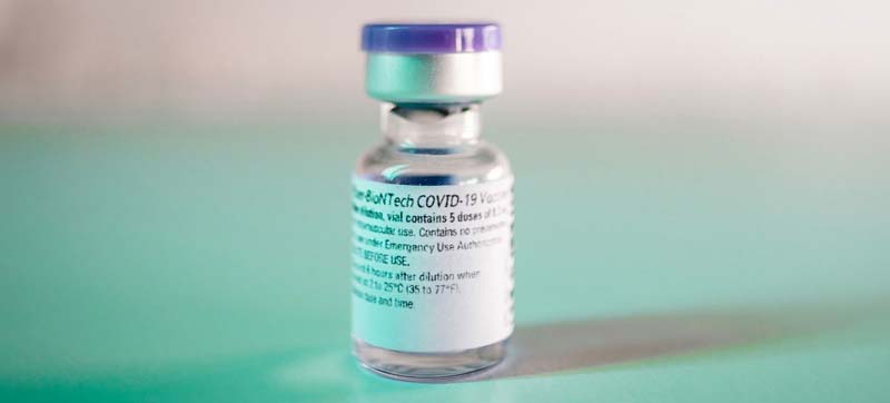 Two billion COVID vaccine doses secured, WHO says end of pandemic is in sight