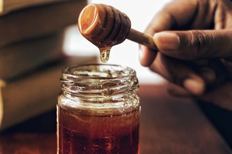 Dabur, Patanjali reject CSE report claiming sugar syrup found in honey