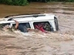 Three killed as car washed away crossing bridge amid heavy rains in Nagpur. See video