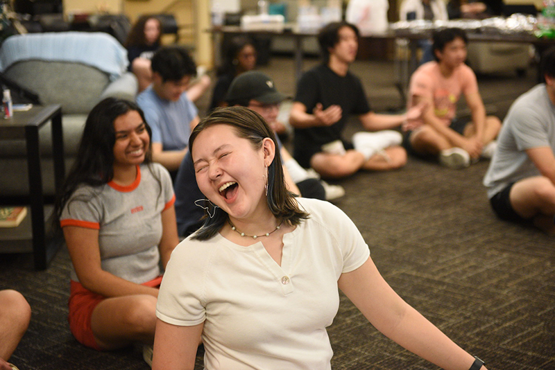 Audrey Garoutte laughs during a yoga class on April 15, 2023, at the University of Missouri in Columbia, Mo. (Maya Morris/Missouri Business Alert)