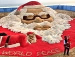 Artist Sudarshan Pattnaik creates world's largest sand Santa Claus face on Puri beach 