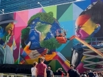 Brazilian artist’s mural ‘for the planet’ proves big draw for UN General Assembly
