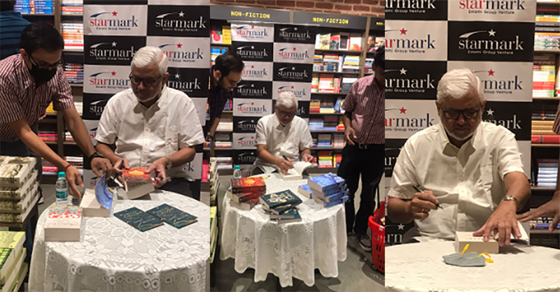 Indian writer Amitav Ghosh signs copies of his new book The Living Mountain for Kolkata readers