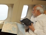 PM Modi announces Rs 1000 cr for cyclone-hit Andhra, surveys Vizag