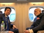 Narendra Modi travels on bullet train