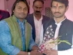 Bihar Health minister's picture with murder accused goes viral in social media
