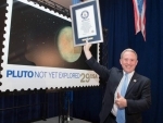 New horizons Pluto stamp earns Guinness World Record