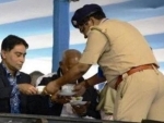 West Bengal: Police officers serve tea to chief minister and other guests during administrative event