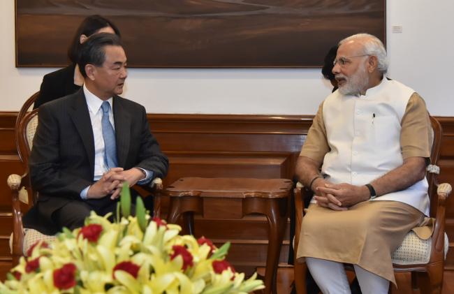 Amid strained ties over NSG Chinese Foreign Minister meets PM Modi at his residence
