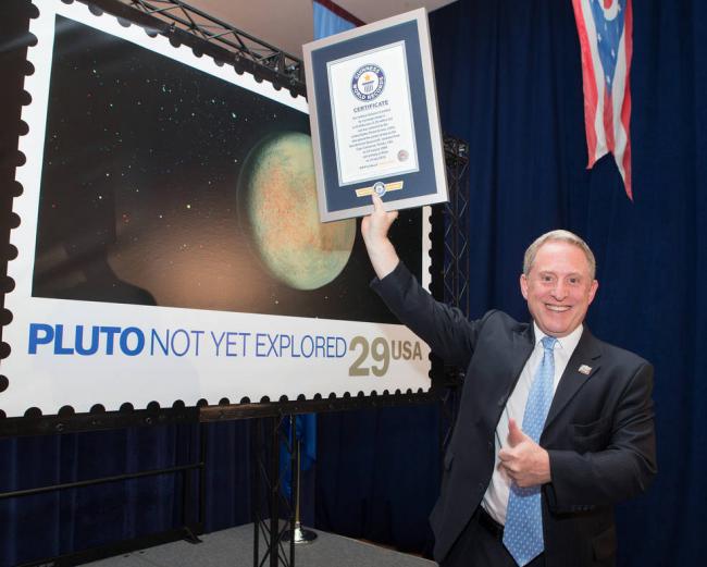 New horizons Pluto stamp earns Guinness World Record