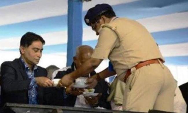 West Bengal: Police officers serve tea to chief minister and other guests during administrative event