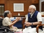 103 year old widow ties a Rakhi on PM