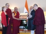 PM Modi presents sacred Buddhist texts to Gunzechoinei Buddhist Temple in Russia