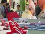 Indonesia Air Asia flight to Bali experiences mid-flight crisis; passengers allege crew behaviour aggravated the panic 