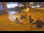 Heavy rains hit normal life in Bangalore, woman rescued from submerged car