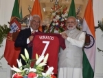 Modi receives jersey from Portugal PM Antonio Costa