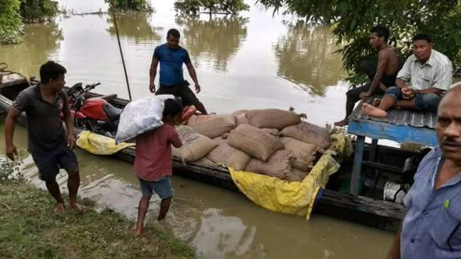 Assam reels under severe flood : Death toll mounts to 104