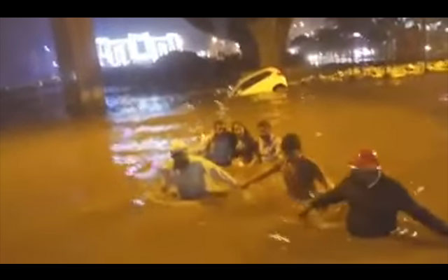 Heavy rains hit normal life in Bangalore, woman rescued from submerged car