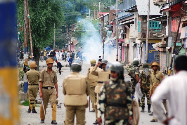 Fresh protests roil Kashmir, police say youth died in hand grenade blast
