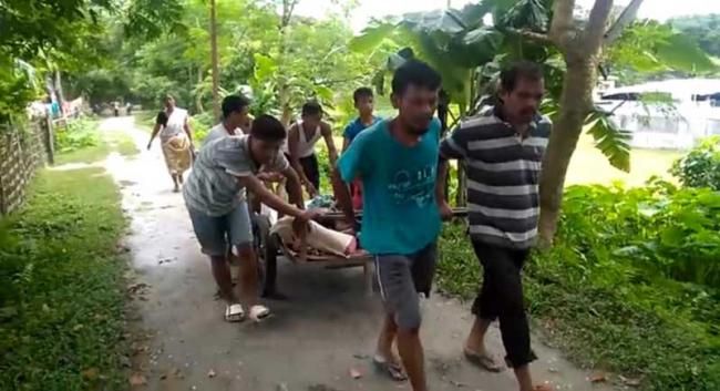 Teacher dies in hospital after being carried in hand cart through broken roads in Assam's Majuli