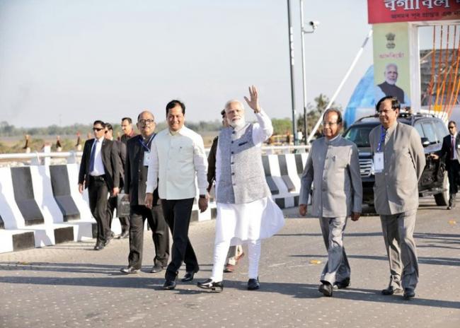 PM Narendra Modi dedicates Bogibeel bridge to the nation; flags off first passenger train 