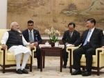 Narendra Modi, Xi Jinping meet in Wuhan, exchange views on solidifying bilateral relationship