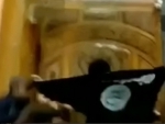 Masked youth storms historic Jamia Masjid in Srinagar, unfurls ISIS flag 