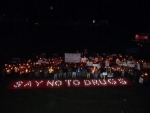 Assam Rifles conducts candle light march against drugs and HIV/AIDS